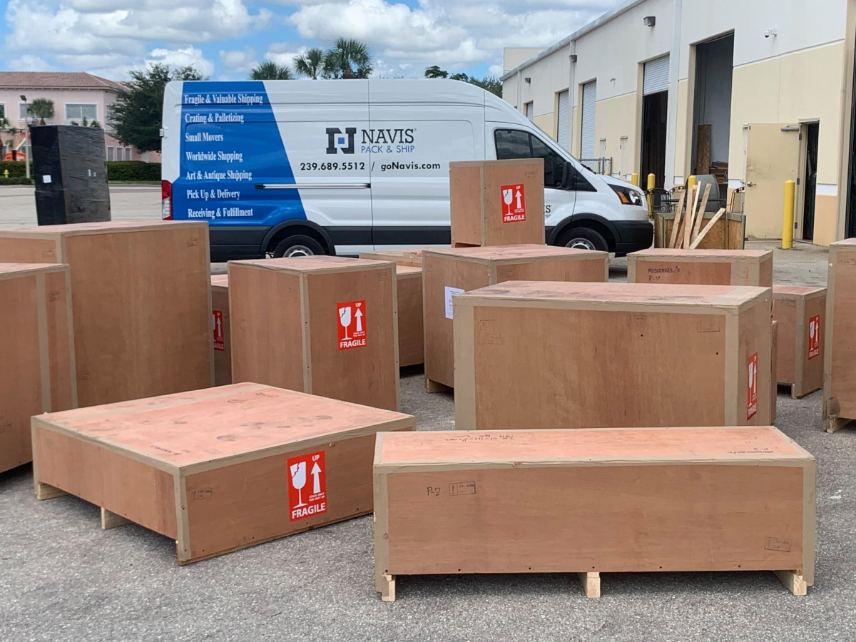 Navis van with large crates ready for shipment