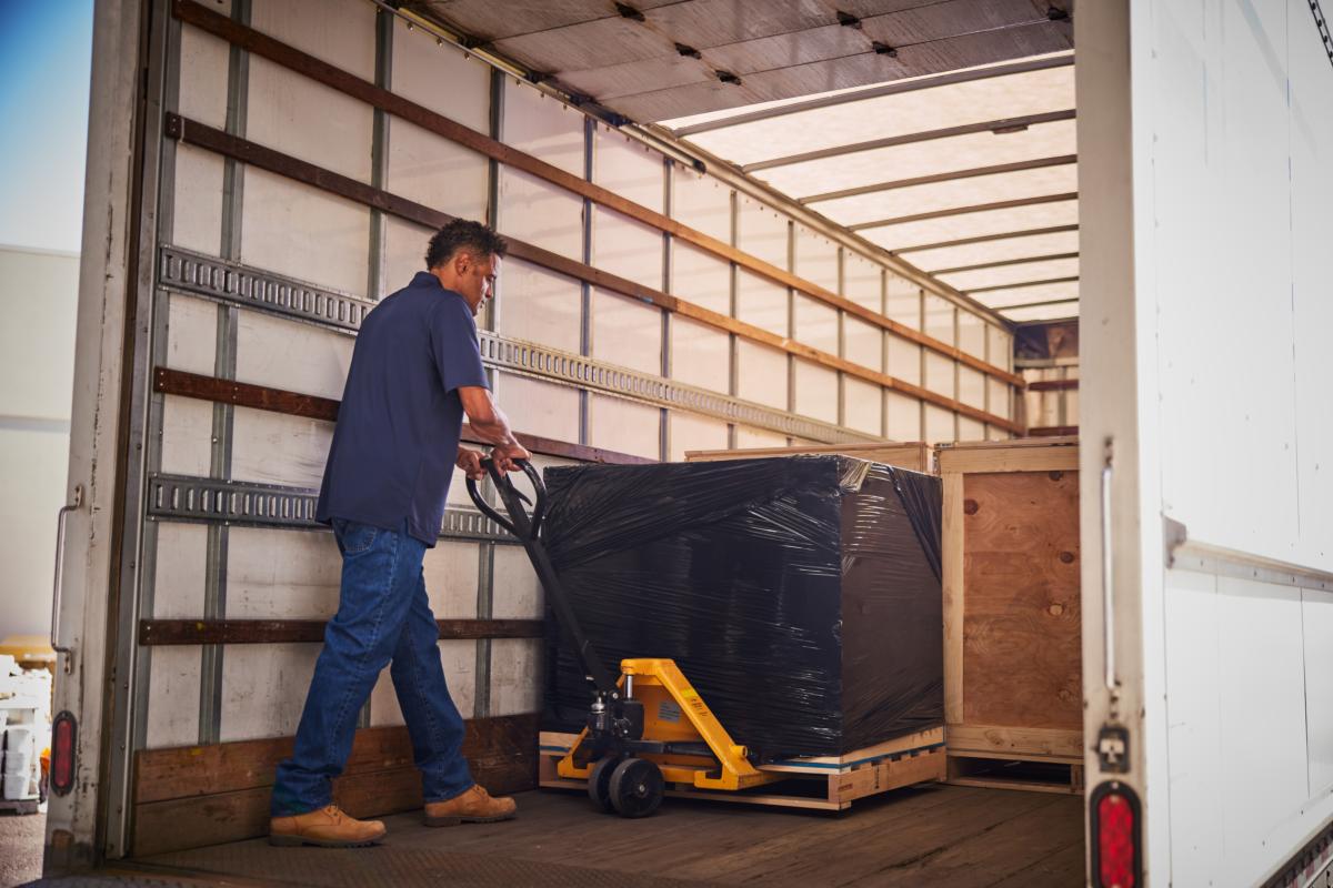 Unloading relocation assets from a Navis truck.