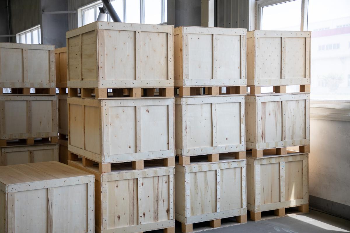 large crates aligned in warehouse